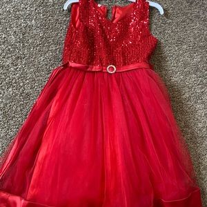 Little girl’s red sequin dress